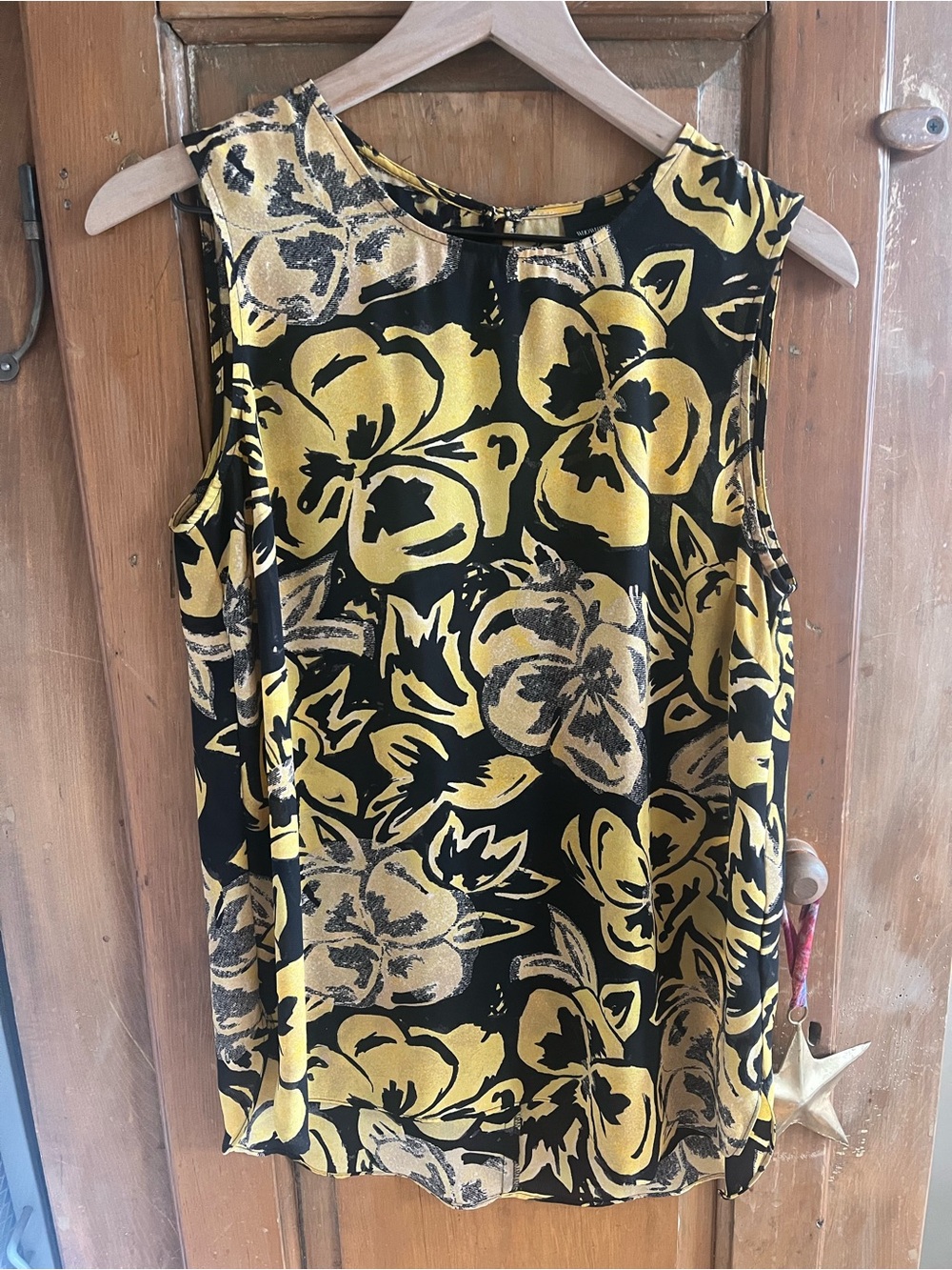 Sleeveless Black and Yellow Floral Blouse